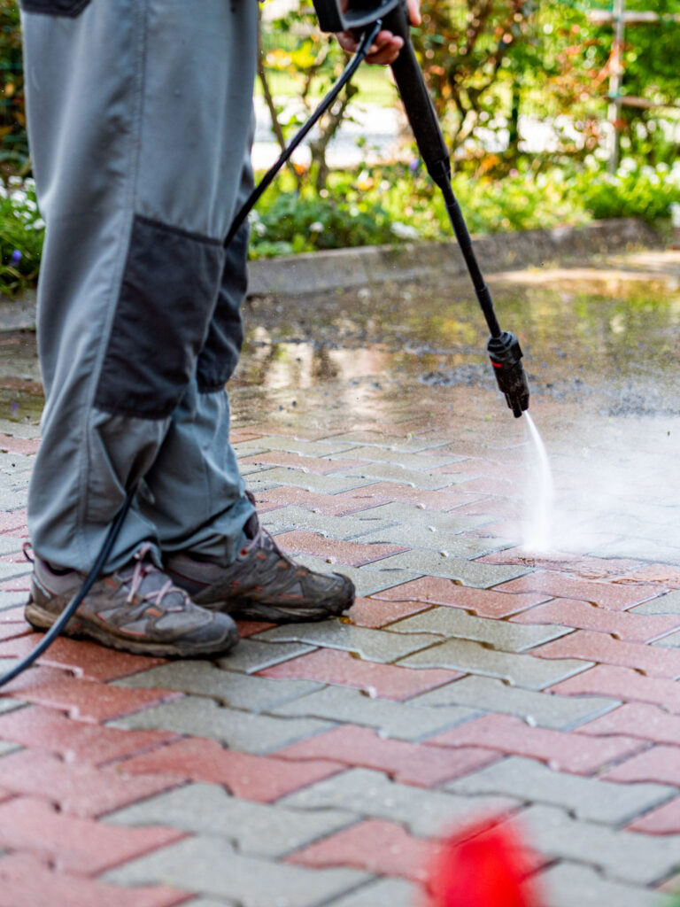 Pressure Washing Outdoor Tiles As Part Of The Deep Cleaning Service